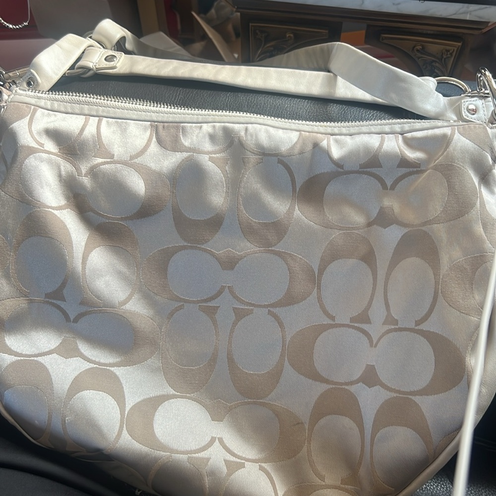 Coach. NWOT. Shoulder and short strap bags. Cream leather bottom.